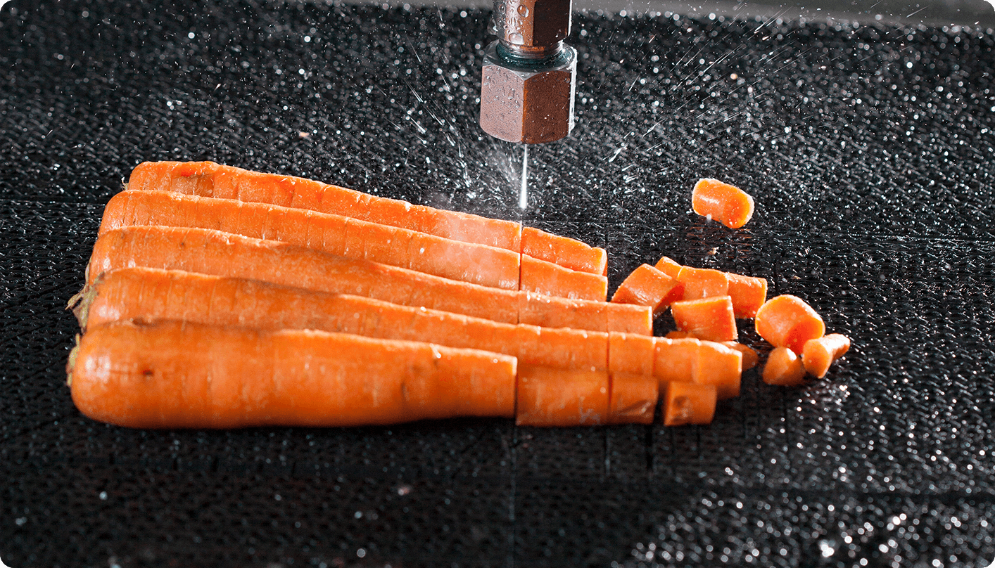 Water-only waterjet cutting carrots.