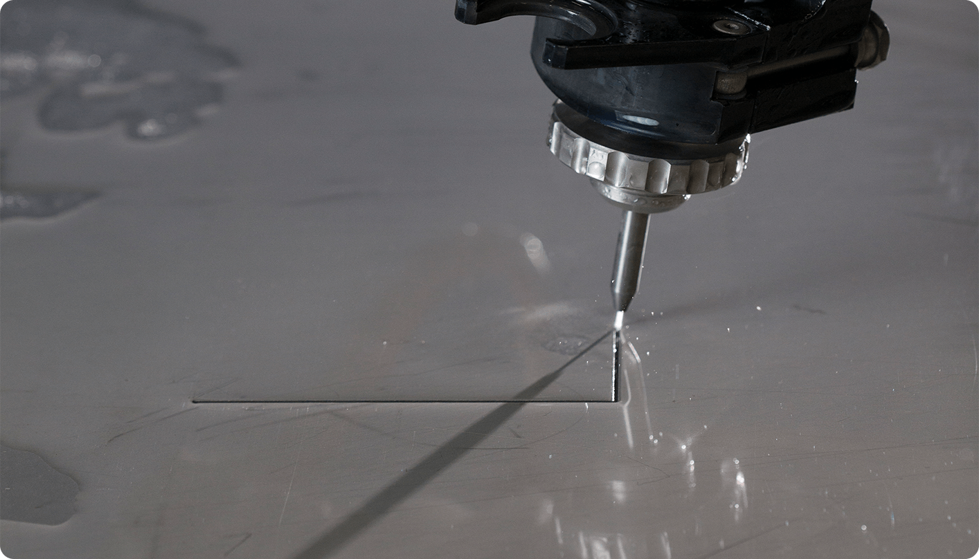 up close image of the kerf a waterjet leaves when cutting