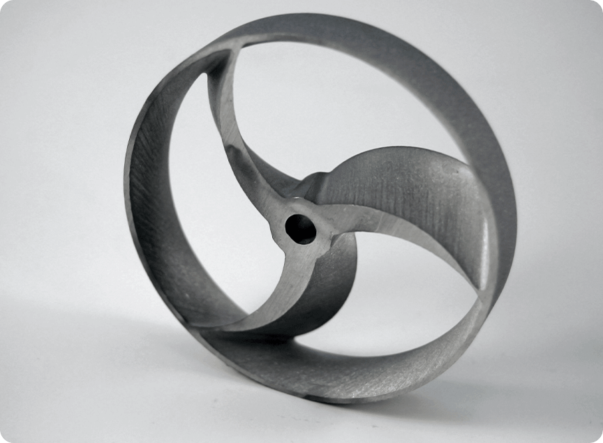3 blade impeller shape cut with a circle surrounding it