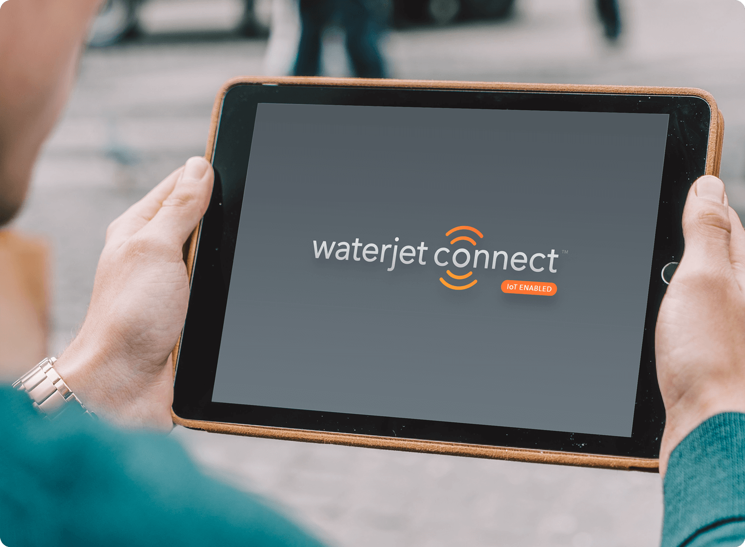 photo the Waterjet Connect logo on a tablet screen